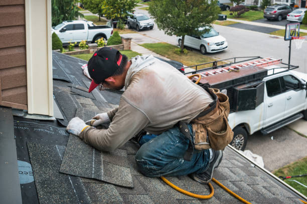 Professional Roof Leak Repair technician working in Thompson, OH